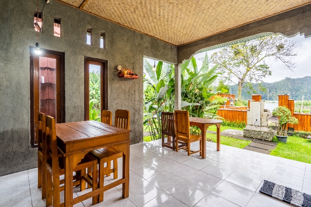 Cafe with views of the pool, garden and hills