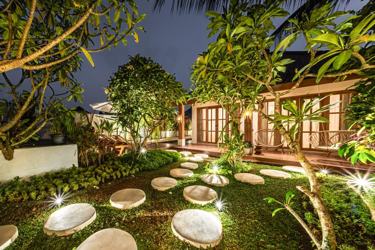 Patio with gazebo, swing, seating area and swimming pool,Night view